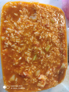 Una foto de Arroz caldoso de calabacín y gambones en mambo
