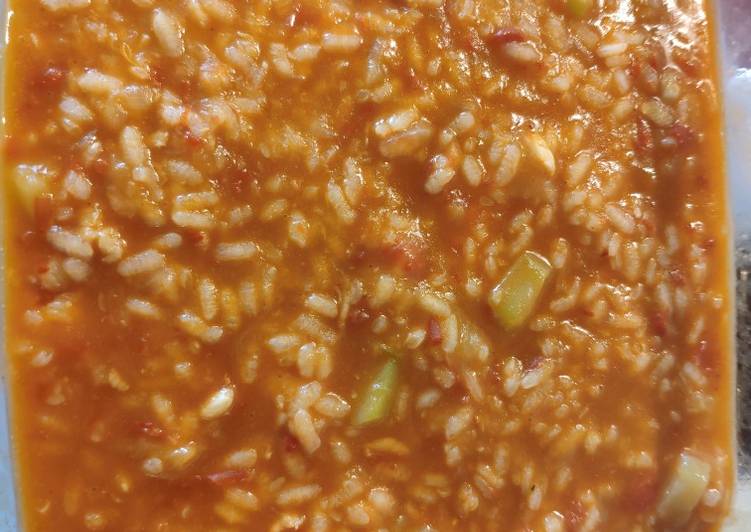 Arroz caldoso de calabacín y gambones en mambo