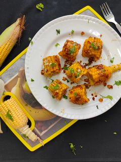 स्पाइसी गार्लिक चीज़ मसाला भुट्टा रेसिपी मुख्य फोटो