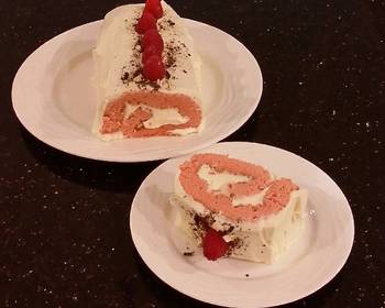 Ready to Serve Fresh Rasberry Cake Roll with Whipped White Chocolate Ganache Filling and Frosting Delicious Simple