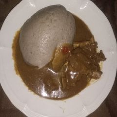 Tuwon dawa with miyan kuka A picture of Tuwon dawa with miyan kuka.