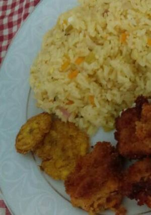 A picture of Yellow Rice with Homemade Chicken Nuggets.