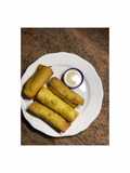 Spring rolls and a garlic dip