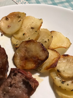 Una foto de Papas al horno
