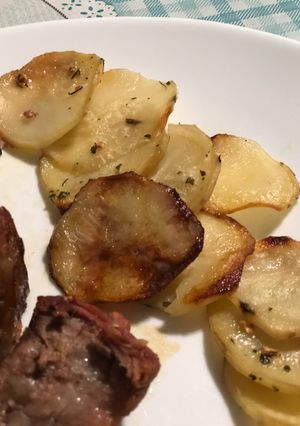 Una foto de Papas al horno