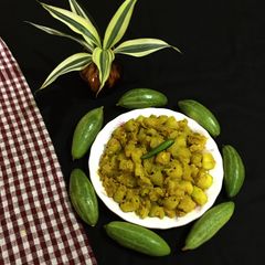 A picture of Pointed Gourd in Sesame Seeds.