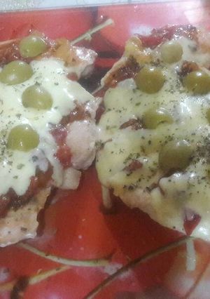 Una foto de Pollo a la pizza en la plancha