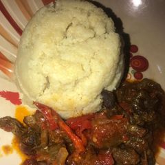 A picture of Cous cous with shredded beef sauce.