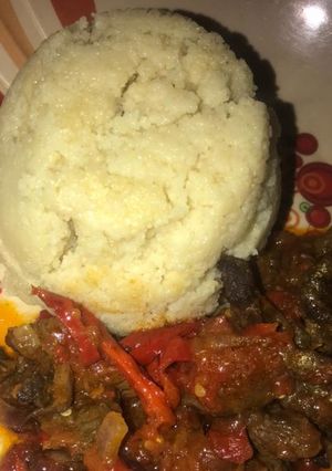 A picture of Cous cous with shredded beef sauce.