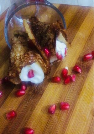 A picture of Sweet jaggery roll with Nuty creamy rabdi.