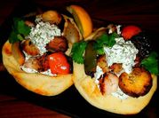 A picture of tzatziki with sour cream