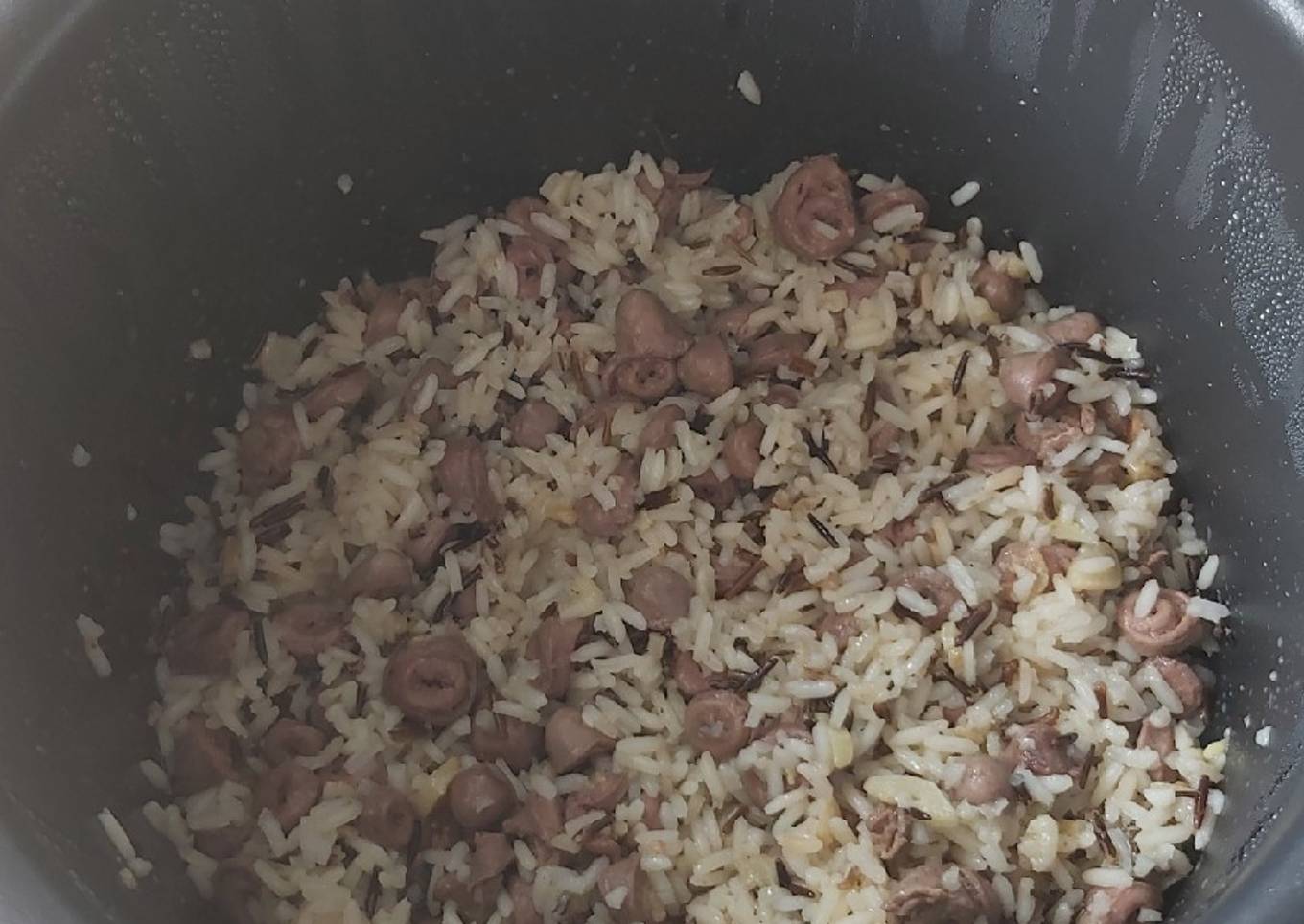 Arroz blanco con asadura de pollo