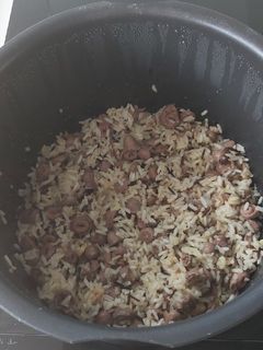Una foto de Arroz blanco con asadura de pollo