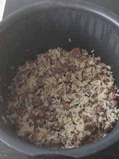 Una foto de Arroz blanco con asadura de pollo