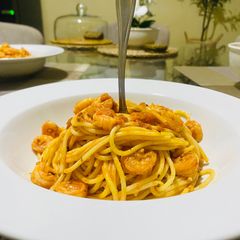 A picture of Shrimp Pasta with Tomato Sauce.