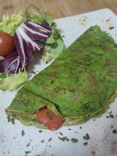 Una foto de Crepes de espinacas con salmón y queso