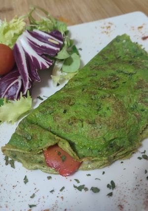 Una foto de Crepes de espinacas con salmón y queso