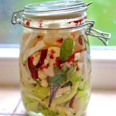 A picture of Fermented cauliflower with pink pepper corn and chilli 🌳🌶.