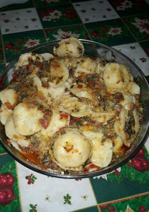 Una foto de Sorrentinos con salsa