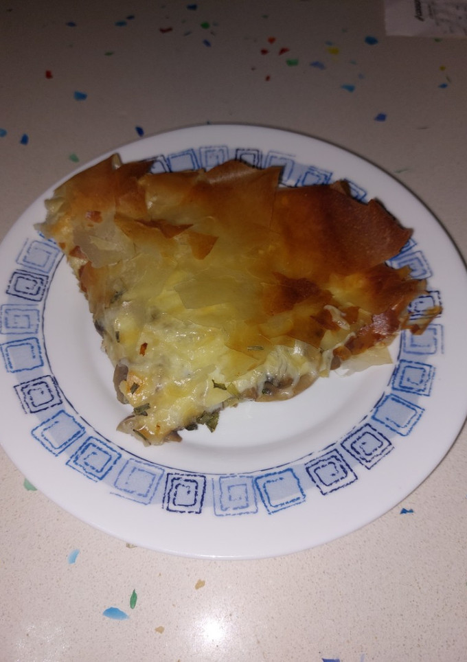 Una foto de Tarta crujiente de champiñones y quesos