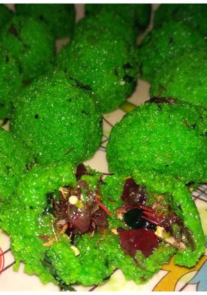 A picture of Narikeler ladoo or paan bites or pan ladoo.