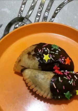 A picture of #Holi2022#Holi special - Chocolate dipped Gujiya.