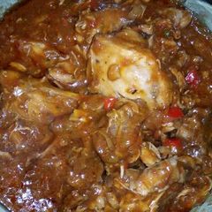 A picture of Chicken in tomatoes gravy.