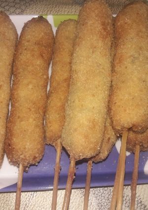 Una foto de Brochettes de picada de pollo empanados