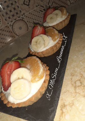 صورة لوصفة 🍓🍌🍊 تارتولات بالفواكه و كريمة الديبلومات 🍓🍌🍊