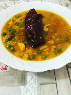 Una foto de Arroz con pollo y bacalao