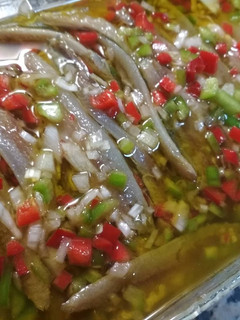 Una foto de Tapa de boquerones aliñados