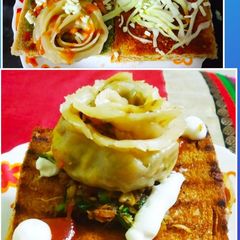 A picture of Spinach & Veggie stuffed Momo Sandwich.