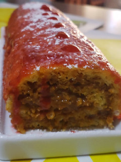 Una foto de Brazo de reina manjar frutilla