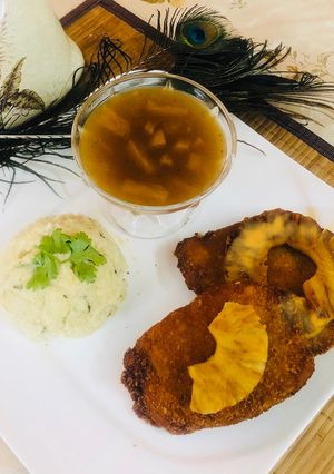 A picture of Stuffed 🧀 Chicken🐓With Pineapple 🍍Sauce(restaurant style).