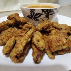 A picture of Fried aubergine fingers.