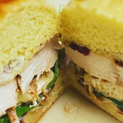A picture of Grill chicken and brie sandwich.