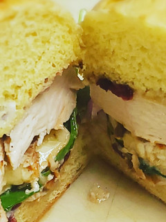 A picture of Grill chicken and brie sandwich.