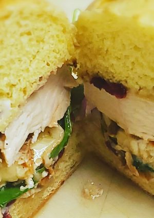 A picture of Grill chicken and brie sandwich.