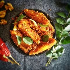 Roasted potato with walnut masala mix A picture of Roasted potato with walnut masala mix.