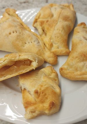Foto principal de Empanadillas de hojadre rellenas de manzana 🍎 asada con miel 🍯