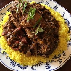 A picture of California Farm Turkey Wing over Basmati Rice.