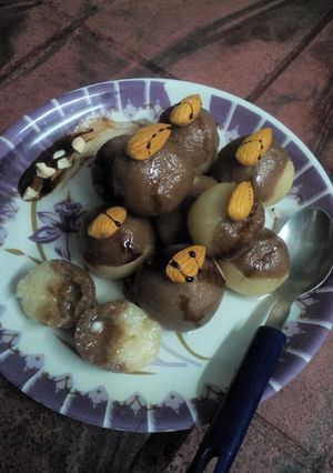 A picture of Two In One brown semolina rasgulla.