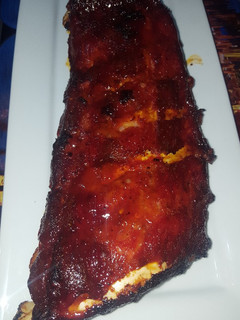 Una foto de Costillas adobadas al horno con salsa de kétchup y miel