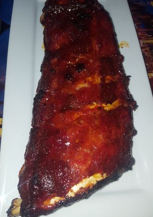 Una foto de Costillas adobadas al horno con salsa de kétchup y miel
