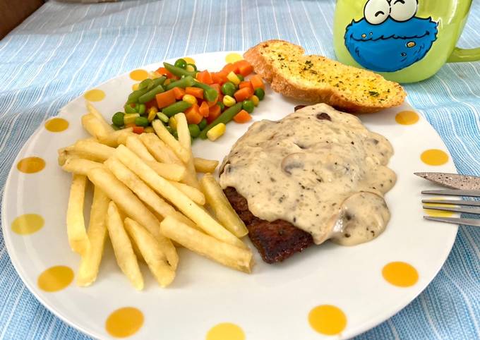 Beef steak w/ mushroom sauce