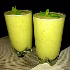 A picture of Pineapple, apple, banana and mint.