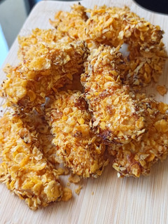 Une photo de Nuggets de poulet et corn-flakes au four