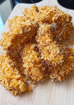 Une photo de Nuggets de poulet et corn-flakes au four