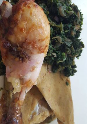 A picture of Fried chicken with vegetable.