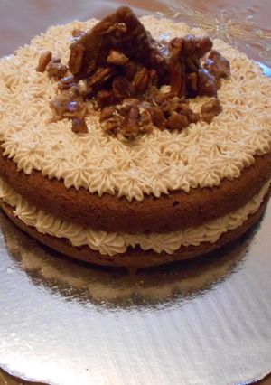 Una foto de Pastel de zanahoria y café con nueces al mascabado